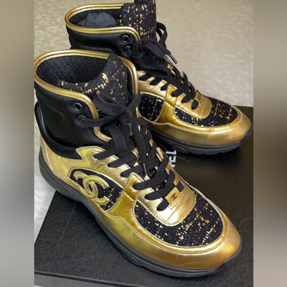Chanel shoes, gold an black